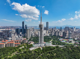 Image: Summer Davos spotlight falls on host city Dalian's economic rise